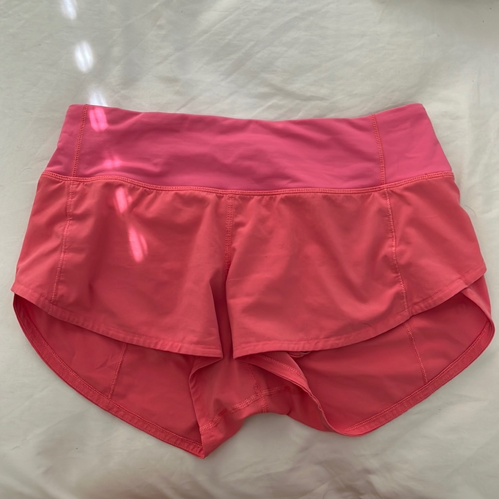 Pink lululemon speed up shorts